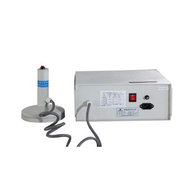 캡 유도 씰링 기계